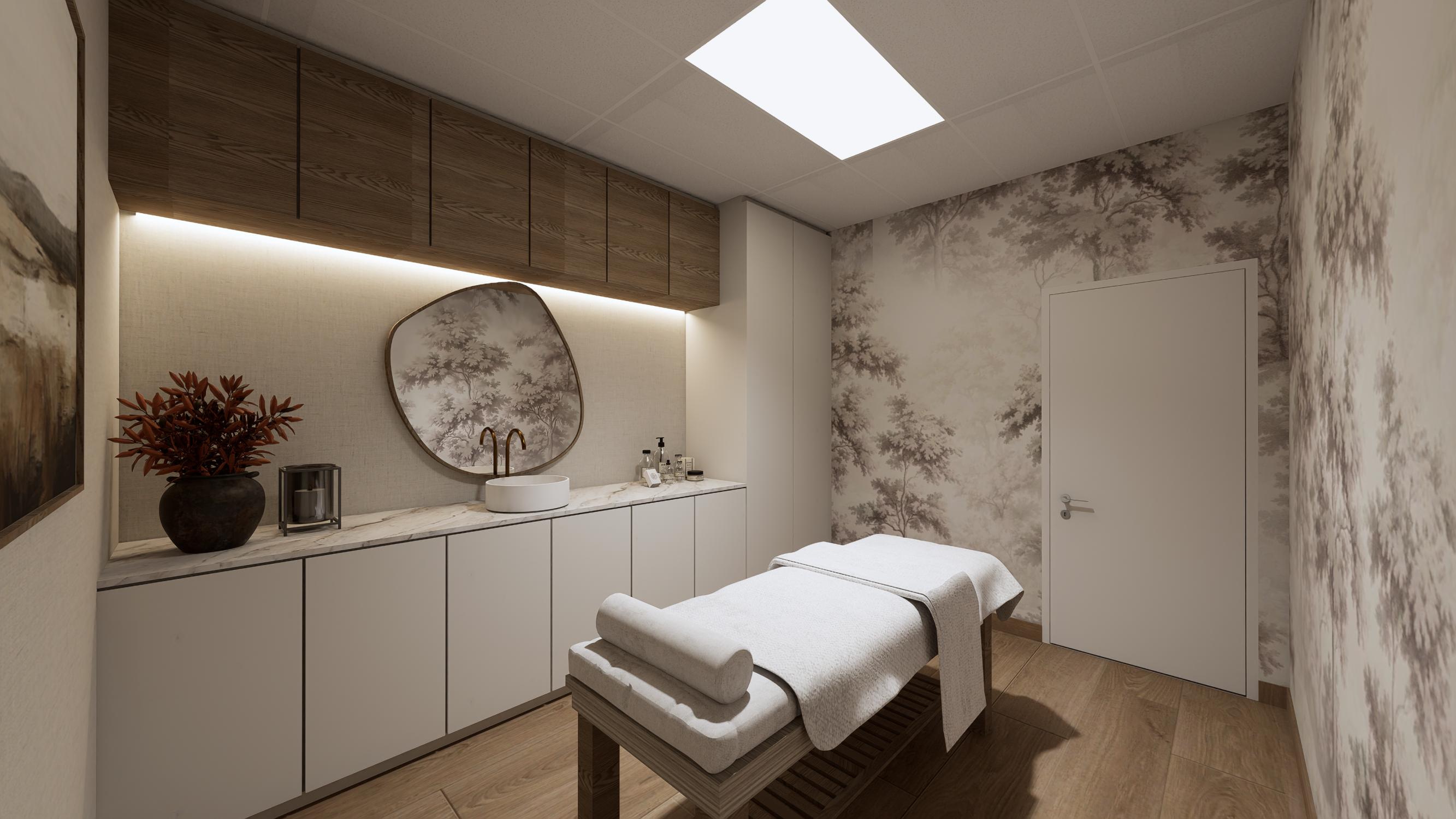 Private spa treatment room with warm cabinetry and treatment bed